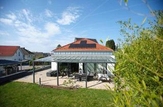 Haus kaufen in 64823 Groß-Umstadt, Groß-Umstadt / Klein-Umstadt - Bungalow der Extraklasse in Feldrandlage
