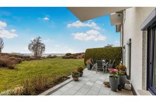 Wohnung kaufen in 24235 Stein, Unbeschwerter Meerblick – Ihr Stranddomizil, bei dem Terrasse und Grünfläche ins Meer übergehen