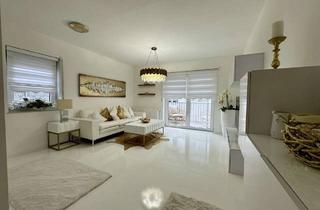 Wohnung kaufen in 55299 Nackenheim, Neuwertige 2-Zi.-Designer-Wohnung in Nackenheim – inklusive Stellplatz