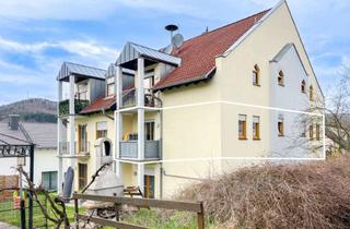 Wohnung kaufen in 97896 Freudenberg, Attraktive 2-Zimmer-Wohnung mit Balkon und 1 Stellplatz