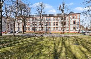 Wohnung kaufen in 24534 Innenstadt, Stilvolle 2,5-Zimmer-Wohnung im klassischen Altbau in Böcklersiedlung-Bugenhagen
