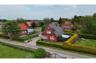 Einfamilienhaus kaufen in 26532 Großheide, Einfamilienhaus in Südarle mit Doppelgarage und Garten