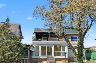 Haus kaufen in 63486 Bruchköbel, Investoren aufgepasst: Brandhaus mit großzügigem Grundstück in Bruchköbel
