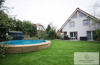 Einfamilienhaus kaufen in 38162 Cremlingen, Wohnen am Feldrand: Gepflegtes EFH mit Pool, Gartenidylle & moderner Technik