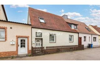 Haus kaufen in 39307 Genthin, Ruhig wohnen, kreativ gestalten: DHH mit Garagen und geräumigem Nebenhaus für Handwerker in Genthin