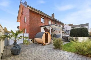 Doppelhaushälfte kaufen in 50127 Bergheim, Gepflegte Doppelhaushälfte in Quadrath mit überdachter Terrasse, Garten und Fasssauna
