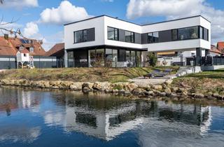 Villa kaufen in 85445 Oberding, AIGNER - Exklusive Architektenvilla mit eigenem Bachzugang mit 435m² Wohn-/Nutzfläche