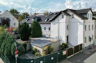 Einfamilienhaus kaufen in 60489 Frankfurt, Frankfurt am Main - Raum für Generationen: Großzügiges Stadthaus mit Kellergewölbe & Garage