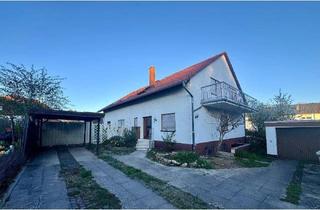 Doppelhaushälfte kaufen in 55291 Saulheim, Saulheim - Familienfreundliches Doppelhaus mit viel Potenzial