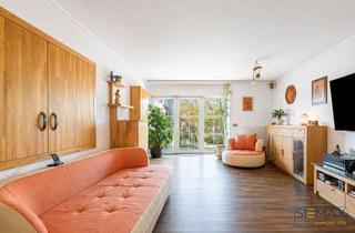 Wohnung kaufen in 85456 Wartenberg, Wohnen auf zwei Ebenen – charmante Souterrain-Maisonette-Wohnung mit Balkon & Garten - Bezugsfrei