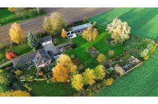 Haus kaufen in Uedemer Straße 203, 47551 Bedburg-Hau, Idyllisch gelegener Bungalow mit Panoramablick, Gästehaus und parkähnlichem Grundstück