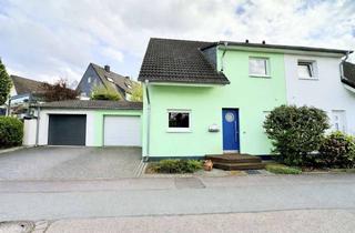 Doppelhaushälfte kaufen in 45133 Schuir, Familientraum: Moderne Doppelhaushälfte mit Garage und sonnigem Garten