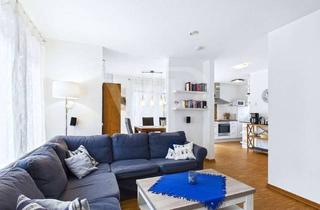 Haus kaufen in 26409 Wittmund, Ihr Rückzugsort am Wasser: Stilvolles Reihenendhaus mit Sauna, Kamin & Terrasse