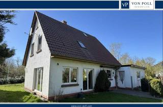 Einfamilienhaus kaufen in 17498 Neuenkirchen, Einfamilienhaus mit Doppelgarage und großem Grundstück