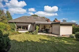 Haus kaufen in 26434 Wangerland, Malerisch wohnen in Minsen - Charmanter Bungalow mit traumhaftem Garten in absolut ruhiger Lage!