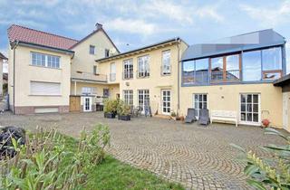 Haus kaufen in 35415 Pohlheim, Elegantes Anwesen mit großzügigem Wohnkonzept