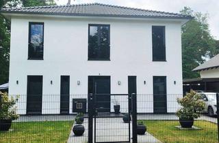 Villa kaufen in 14621 Schönwalde-Glien, Exklusive Stadtvilla mit nachhaltigem Design und außergewöhnlichem Wohnkomfort