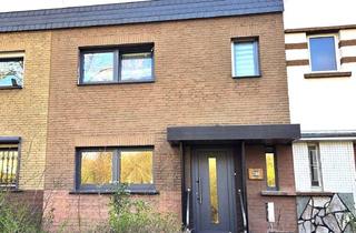 Reihenhaus kaufen in 40599 Hassels, Teilmodernisiertes Reihenhaus mit Garten und Garage