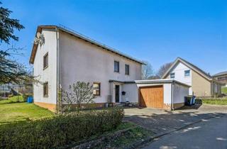 Haus kaufen in 35630 Ehringshausen, Ein neues Zuhause in idyllischer Feldrandlage