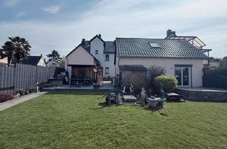 Haus kaufen in 61184 Karben, Karben - Exklusives Wohnanwesen mit Innenhof & Garten vielseitig nutzbar