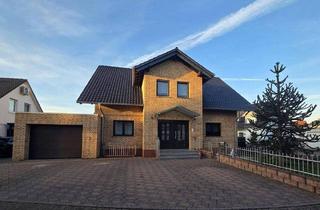 Mehrfamilienhaus kaufen in 55457 Gensingen, Gensingen - Freistehendes Zweifamilienhaus mit großem Garten