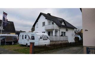 Einfamilienhaus kaufen in 61197 Florstadt, Florstadt - Freistehendes Einfamilienhaus mit Einliegerwohnung