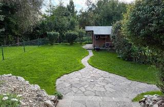 Wohnung kaufen in 85290 Geisenfeld, Geisenfeld - 4-Zimmer-Erdgeschosswohnung mit Garten