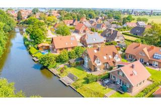 Wohnung kaufen in 26736 Krummhörn, Genehmigte Ferienwohnung in direkter Wasserlage