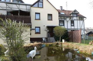 Wohnung kaufen in 57271 Hilchenbach, Eigentumswohnung mit Ladenlokal