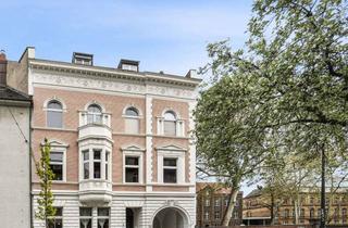 Wohnung kaufen in 40227 Oberbilk, Denkmalgeschützte Maisonette im Dachgeschoss mit Aufzug und Balkon