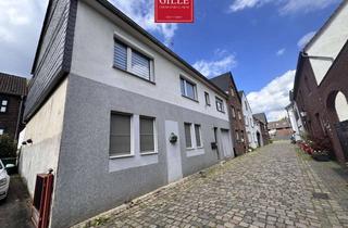 Haus kaufen in 41541 Dormagen, Historischer Charme, moderne Möglichkeiten – Reihenendhaus mit Scheune und Anbau