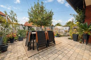 Haus kaufen in 49326 Melle, Familienparadies – viel Platz, sonniger Garten & Wohnen auf einer Ebene!