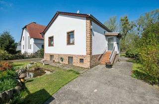 Einfamilienhaus kaufen in 13591 Staaken, Gemütliches Einfamilienhaus mit Wohnkeller und Garage