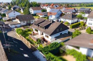 Haus kaufen in 67678 Mehlingen, Attraktives Zweifamilienhaus mit Garten und Garagen