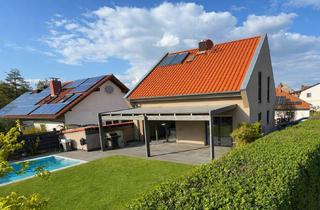 Einfamilienhaus kaufen in 67308 Bubenheim, Freistehendes Einfamilienhaus mit moderner Technik, Südterrasse, Pool und kinderfreundlichem Umfeld