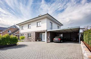 Einfamilienhaus kaufen in Sonnenbrink 12, 49163 Bohmte, Exklusives Einfamilienhaus mit Einliegerwohnung in familienfreundlicher Lage von Bohmte!