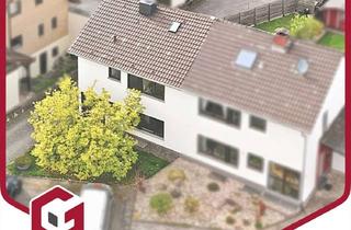 Doppelhaushälfte kaufen in 53359 Rheinbach, NEUER PREIS! Modernisierte und solide vermietete Doppelhaushälfte mit Garten in ruhiger Lage