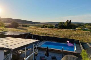 Einfamilienhaus kaufen in 65329 Hohenstein, Hohenstein-Holzhausen: Ein Wellness-Einfamilienhaus der Premiumklasse in direkter Wiesenrandlage!