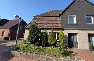Doppelhaushälfte kaufen in 46284 Dorsten, Modernisierte Doppelhaushälfte mit gemütlicher Einliegerwohnung und Garage in ruhiger Wohnlage!