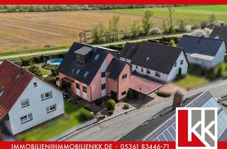 Einfamilienhaus kaufen in 38462 Grafhorst, Grafhorst: Einfamilienhaus mit Einliegerwohnung – flexibel nutzbar mit beeindruckendem Garten