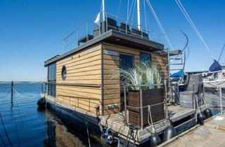 Haus kaufen in 24235 Laboe, Wohnen und Ferien auf dem Wasser: attraktive Kapitalanlage im wachsenden Marktsegment