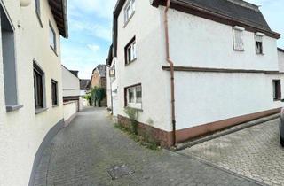 Einfamilienhaus kaufen in 56598 Rheinbrohl, Renovierungsbedürftiges Einfamilienhaus mit Potential Garage und Keller in Rheinbrohl im Zentrum
