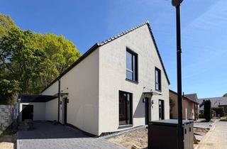 Wohnung kaufen in 41849 Wassenberg, Exklusives Dachgeschosswohnen mit Balkon & attraktiver KfW-Förderung