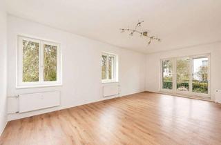 Wohnung kaufen in 14641 Wustermark, Sofort bezugsfrei: Attraktive Familienwohnung mit Terrasse, riesigem Garten und Top-Grundriss
