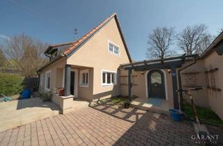 Einfamilienhaus kaufen in 85662 Hohenbrunn, Naturidylle trifft Moderne - Einfamilienhaus mit Einliegerwohnung und großem Grundstück bei München