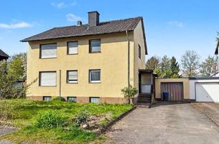 Haus kaufen in 32791 Lage, Erbpacht: Geräumiges Zweifamilienhaus mit Potenzial auf Erbpachtgrundstück in Lage