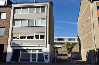 Haus kaufen in 52351 Düren, "Vermietetes Wohn- und Geschäftshaus inkl. Bauparzelle!"