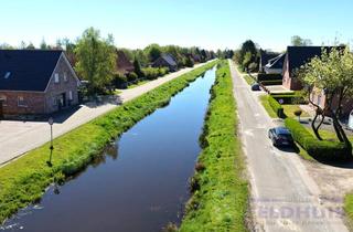 Einfamilienhaus kaufen in 26802 Moormerland, Idyllische Wiekenlage: Charmantes Einfamilienhaus mit viel Potenzial in Jheringsfehn!