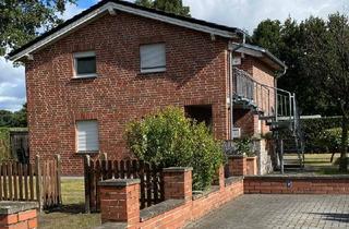 Haus kaufen in 48499 Salzbergen, Salzbergen - Haus mit 2 Wohnungen zu verkaufen
