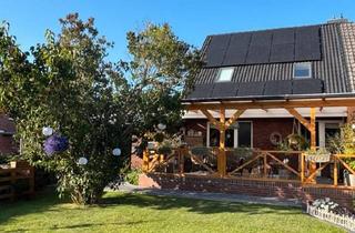 Doppelhaushälfte kaufen in 26506 Norden, Norden - Grüne Oase im Herzen von Norden: Energetisch & modern saniert